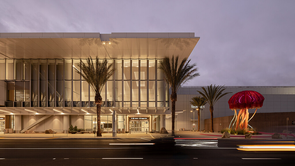 A building with trees in front.