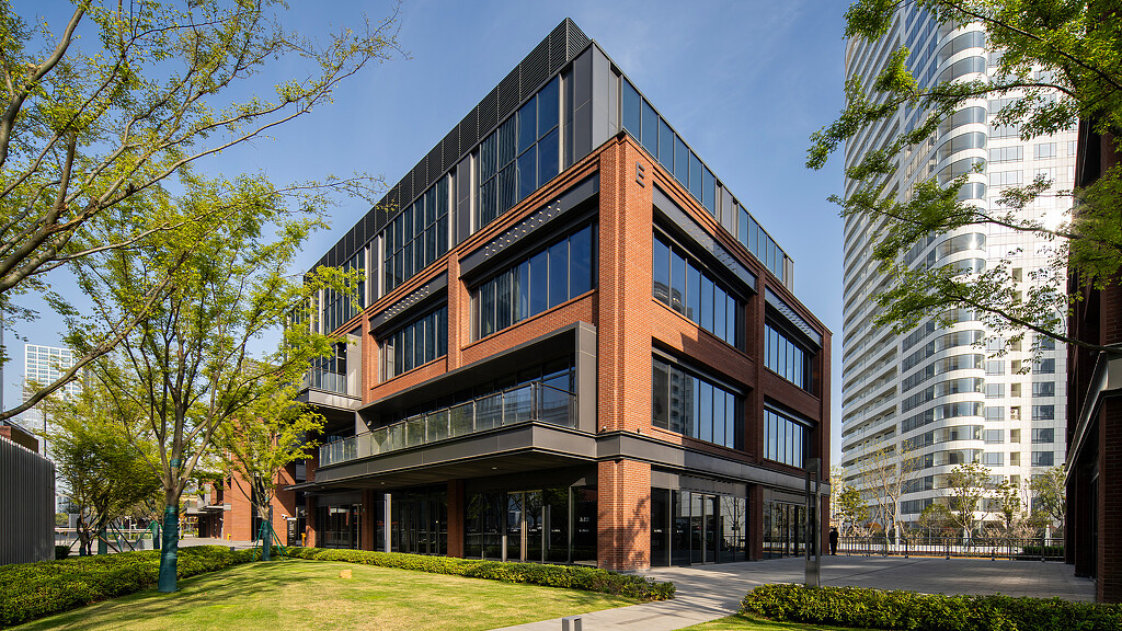 A building with a glass front.