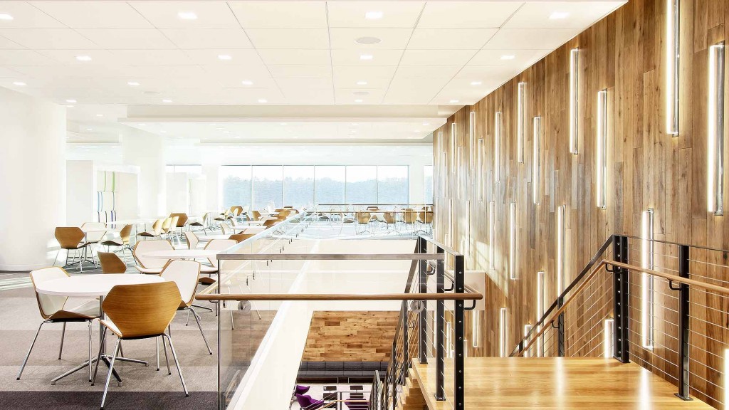 A room with tables and chairs.