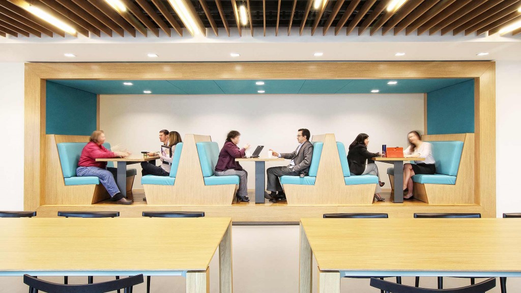 A group of people sitting in a room.