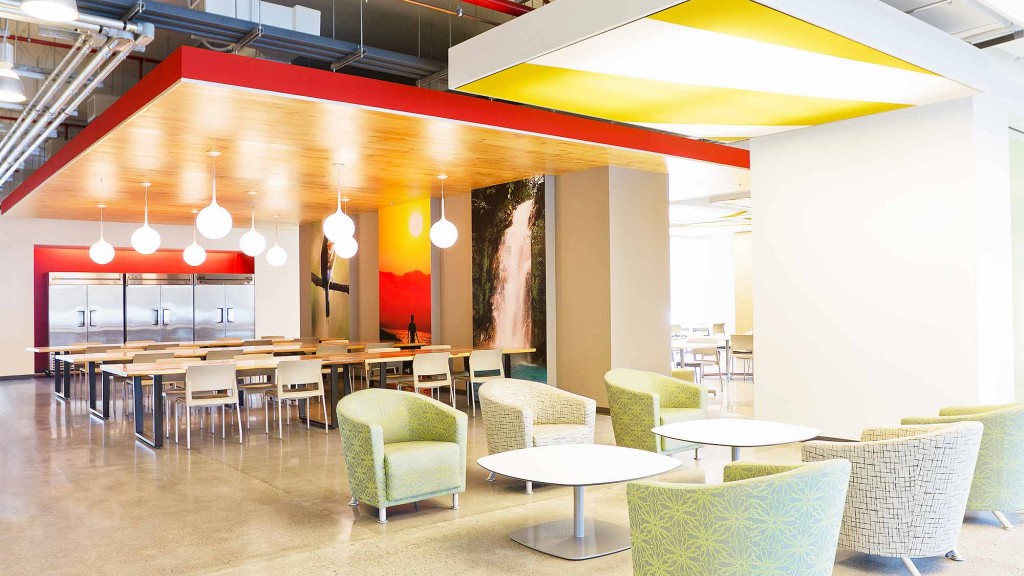 A room with tables and chairs.