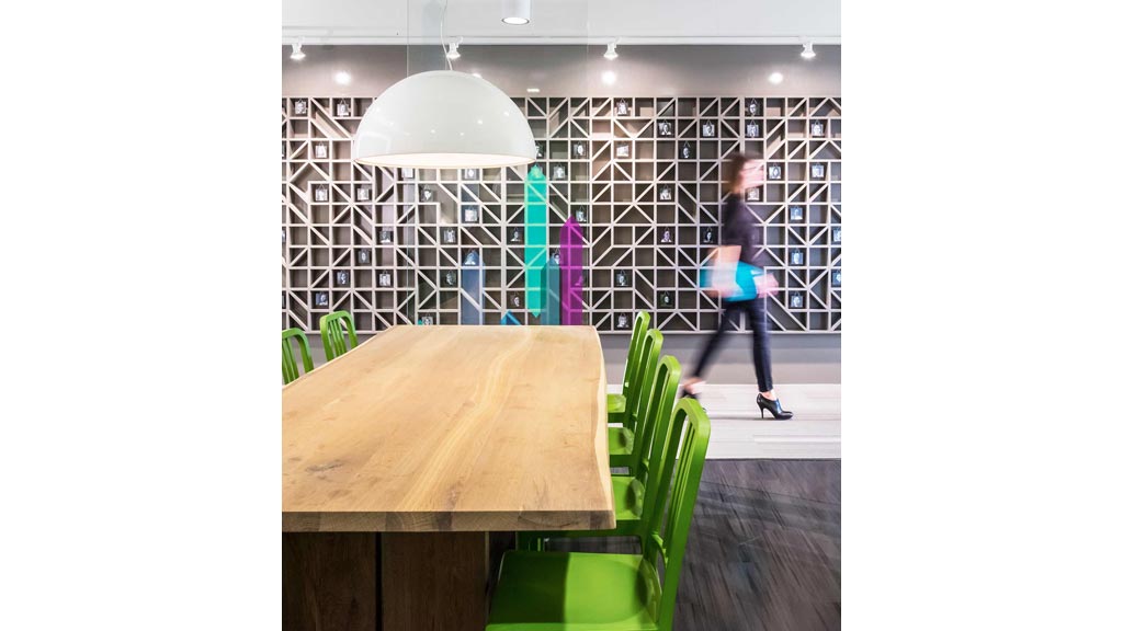 A person walking in a library.