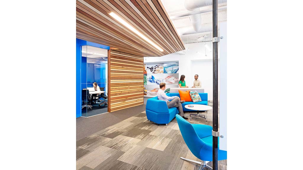 A group of people sitting in chairs.