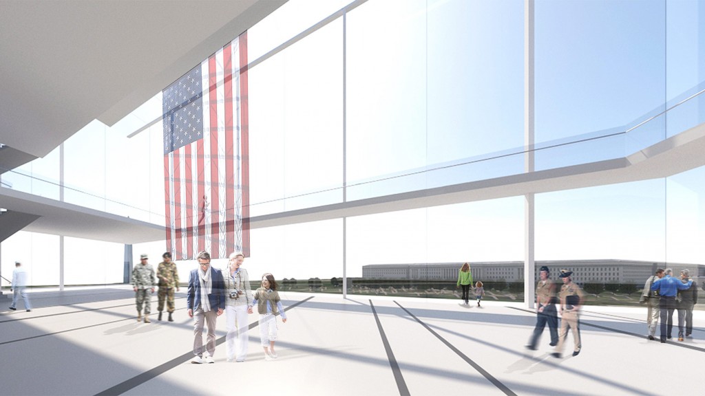 A group of people walking on a bridge.