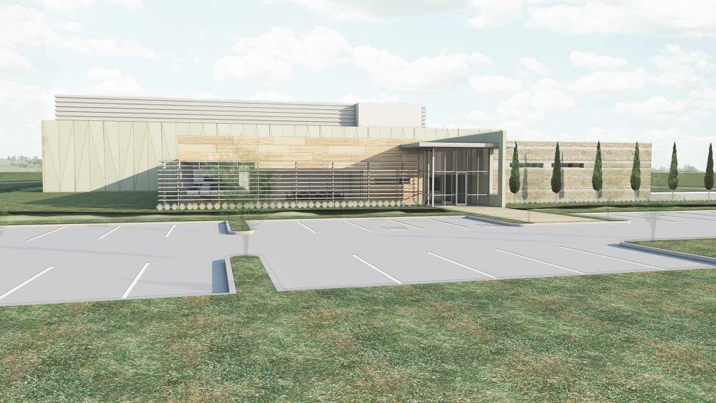 A large building with a parking lot.