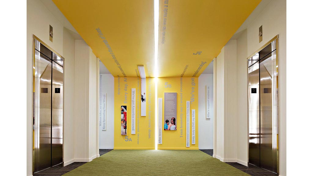 A hallway with yellow walls.