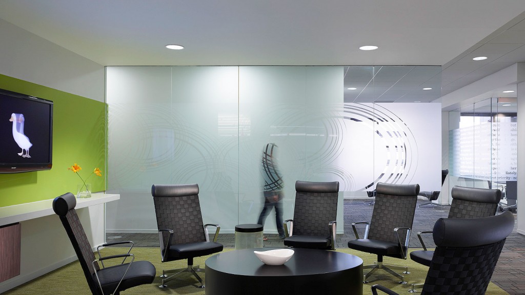 A room with a table and chairs.