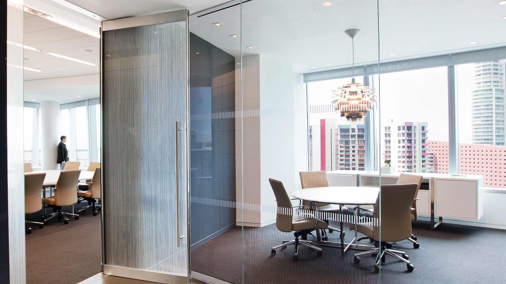 A room with a table and chairs.