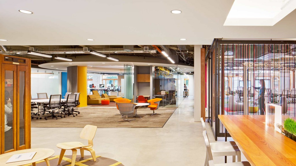 A room with tables and chairs.