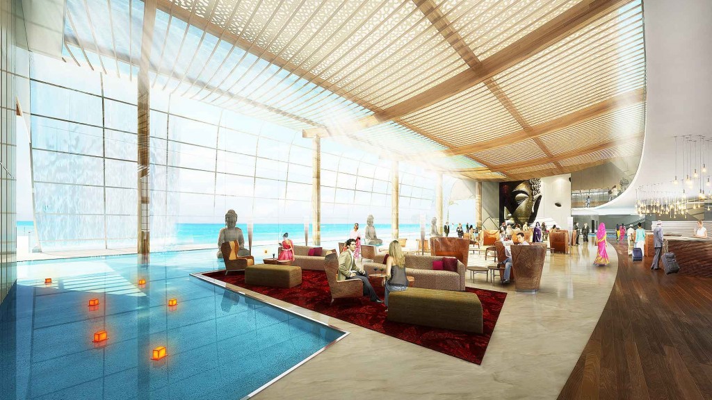 A large room with a pool and couches.