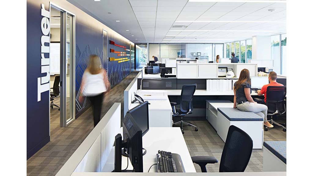 A group of people in an office.