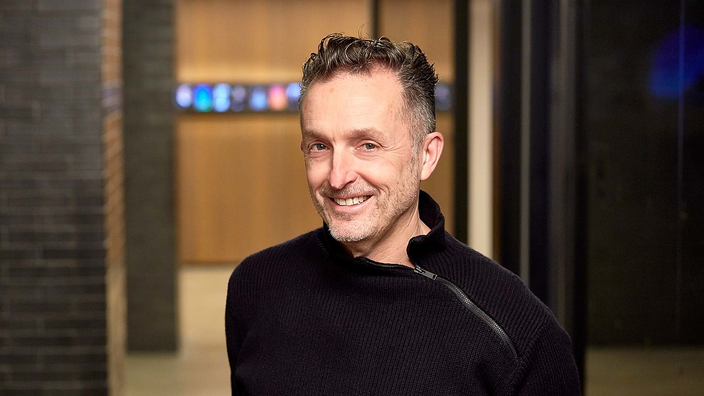 A man smiling for the camera.