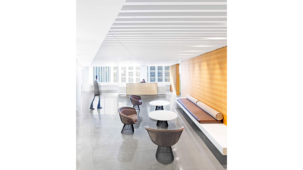 A person walking in a large room.