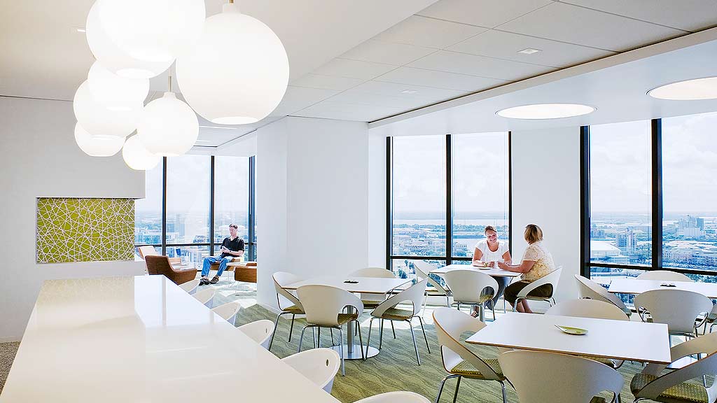 A room with tables and chairs.
