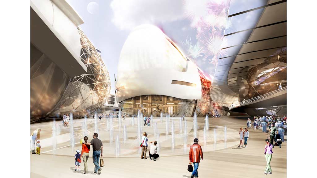 People walking around a large building.