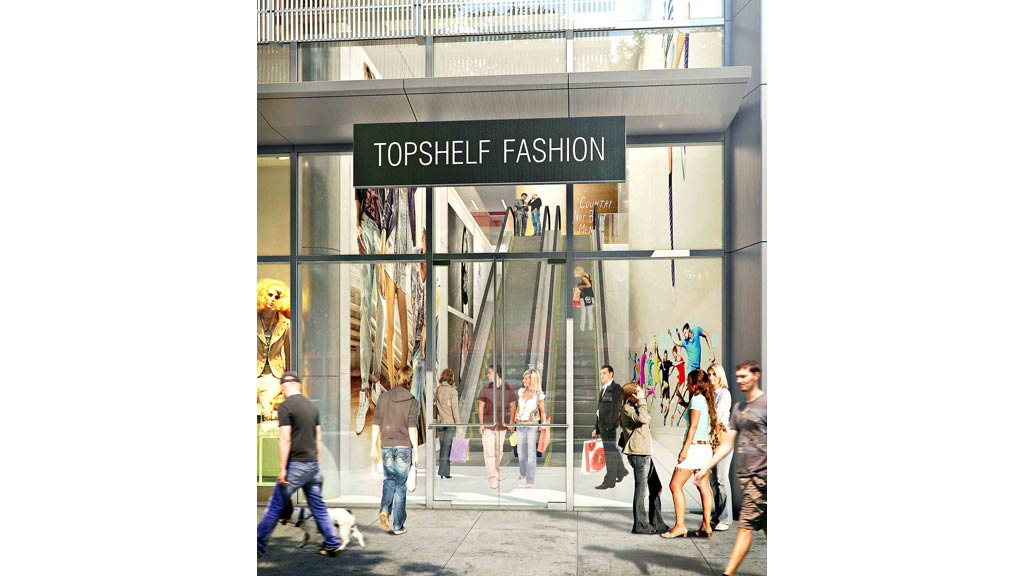 People walking past a store.