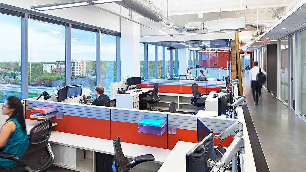 A few people in an office.