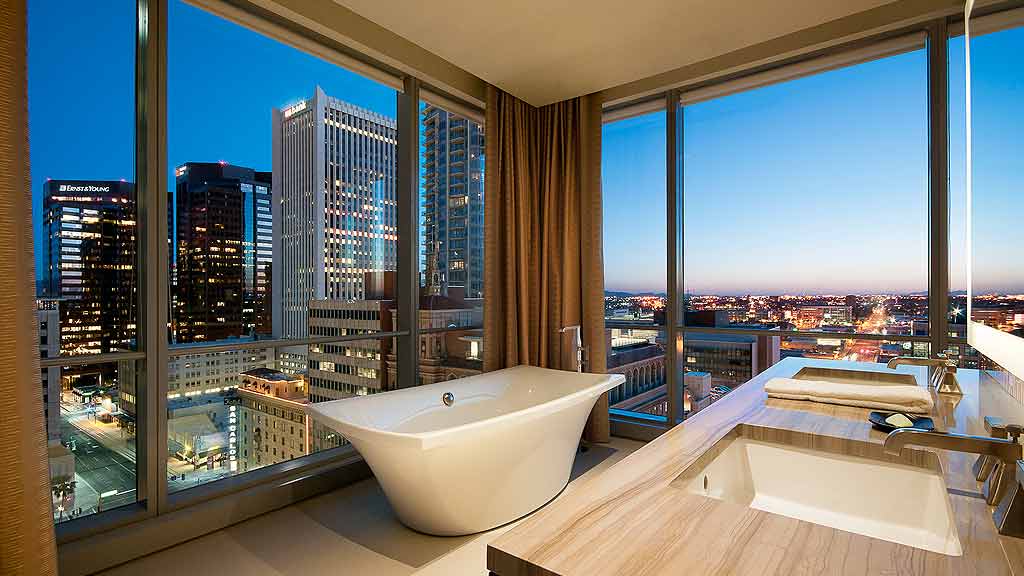 A bathroom with a large window.