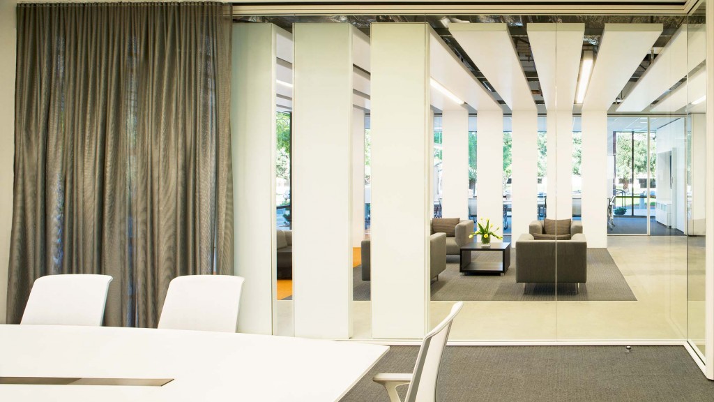 A room with a table and chairs.