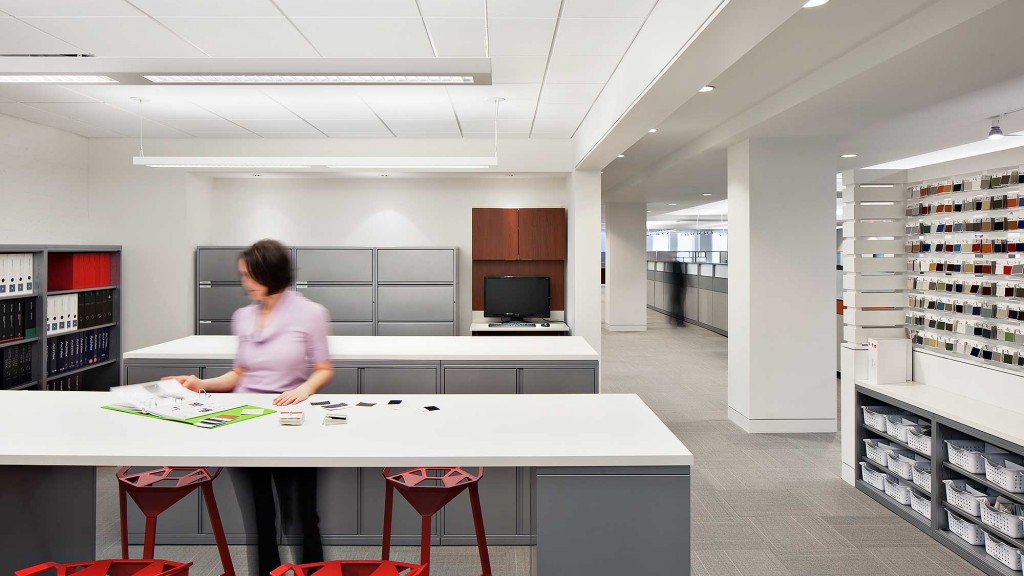 A person standing at a table.