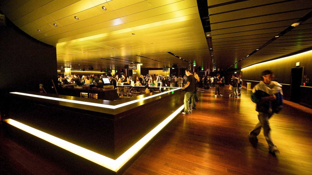 A person walking in a large room.