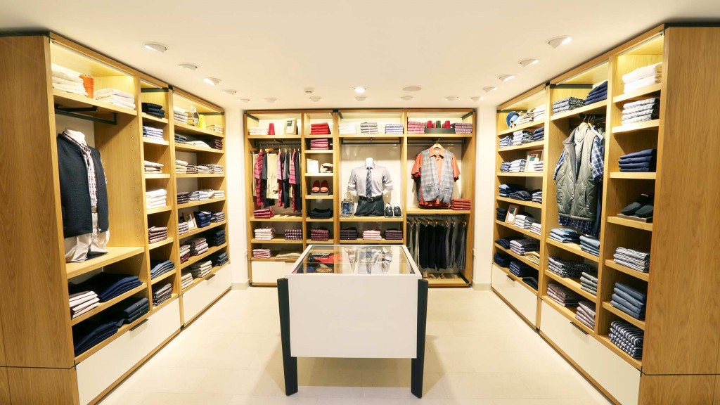 A store with shelves of clothing.