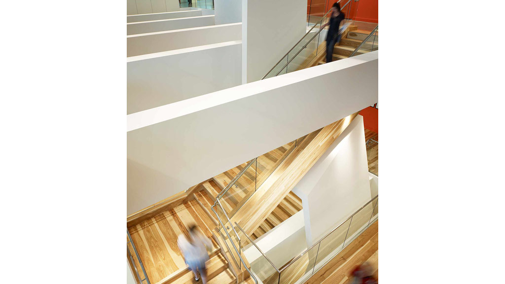 A person walking up a staircase.