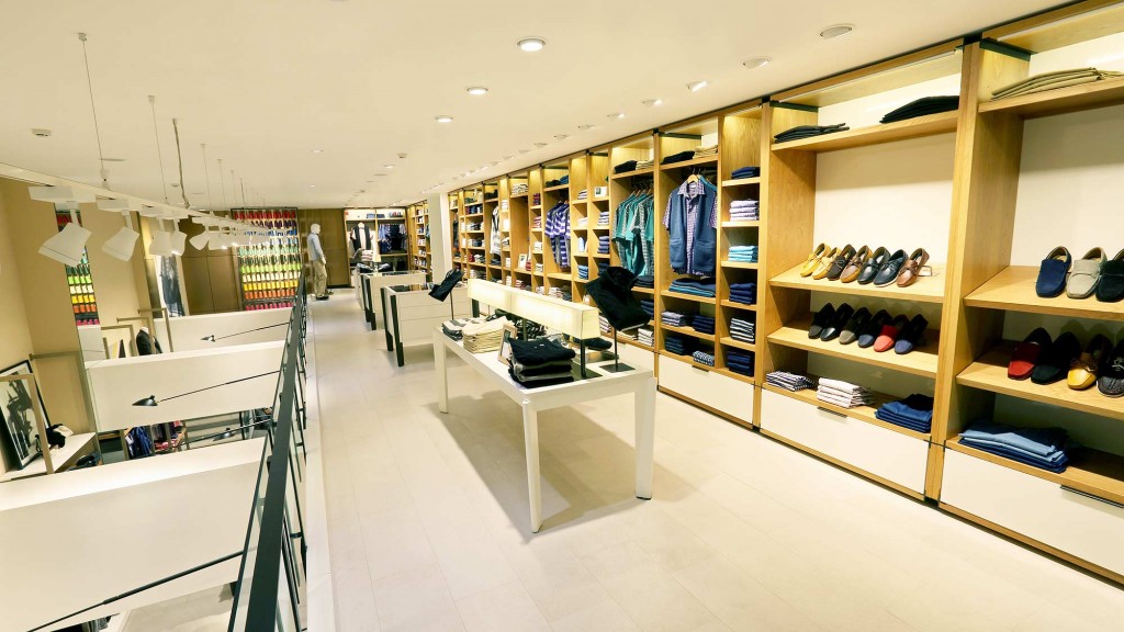A store with shelves and shoes.