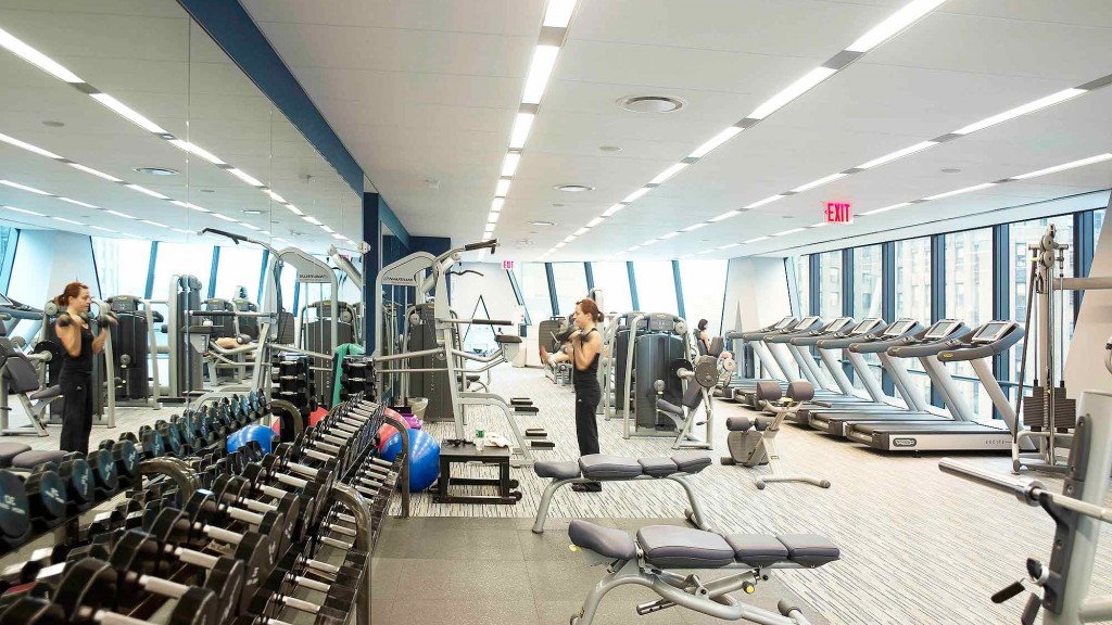 A large room with a few people.