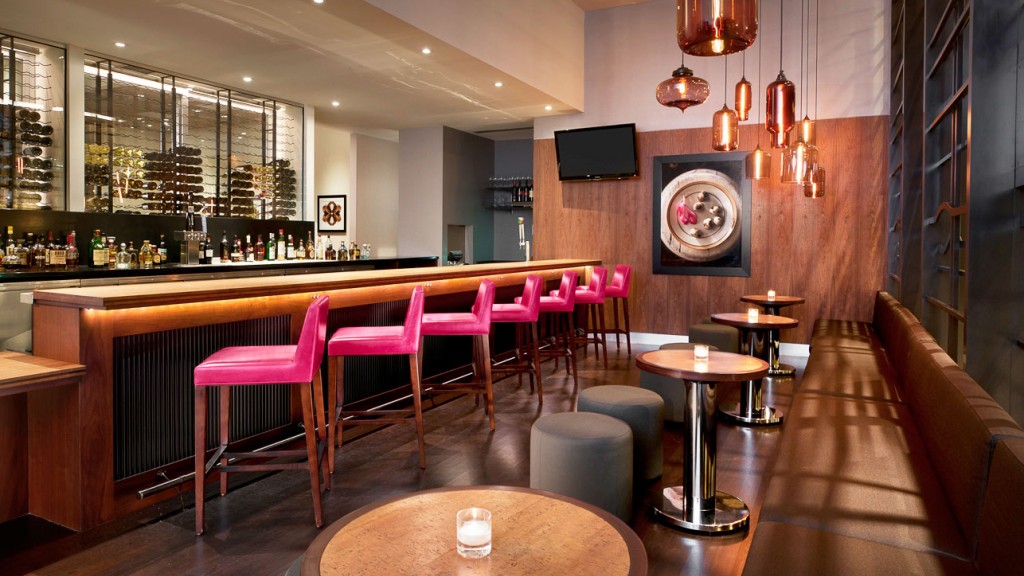 A bar with a bar and chairs.