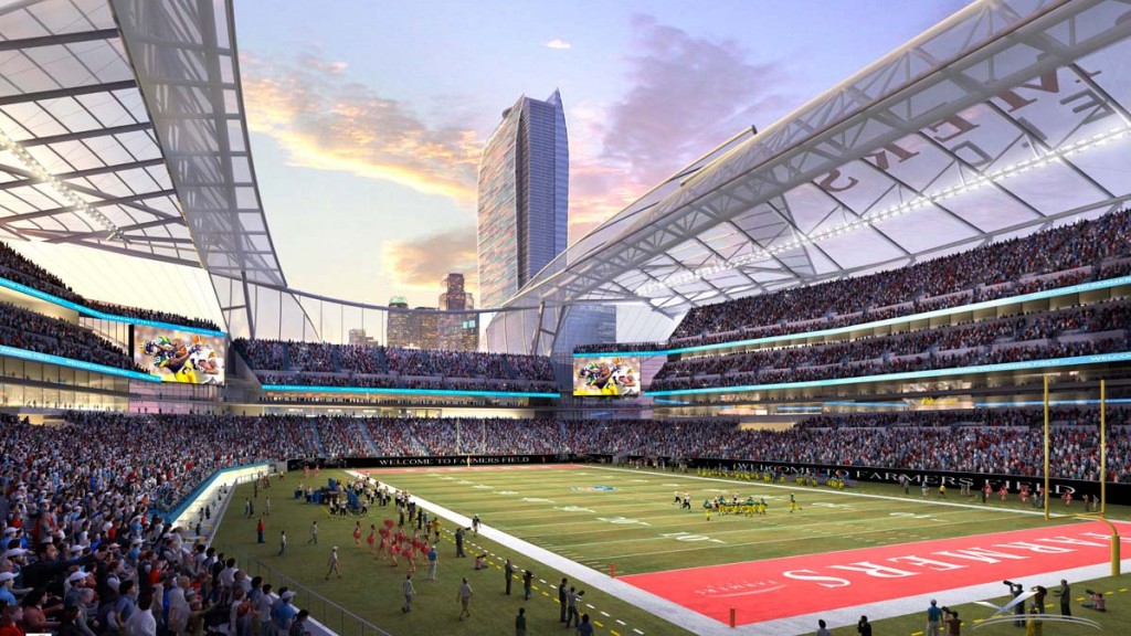 A football stadium with a large crowd with Farmers Field in the background.