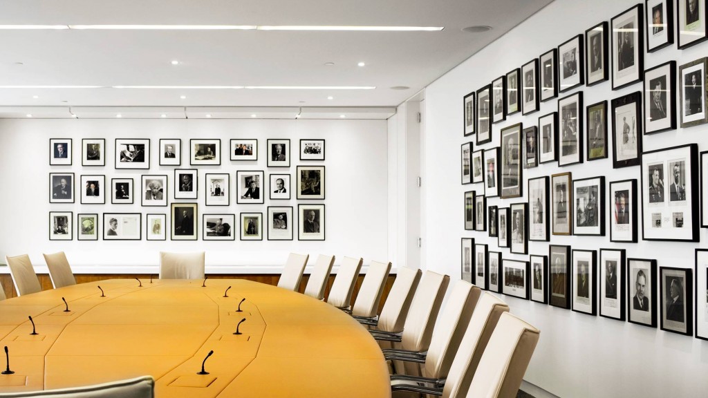 A room with a table and chairs.