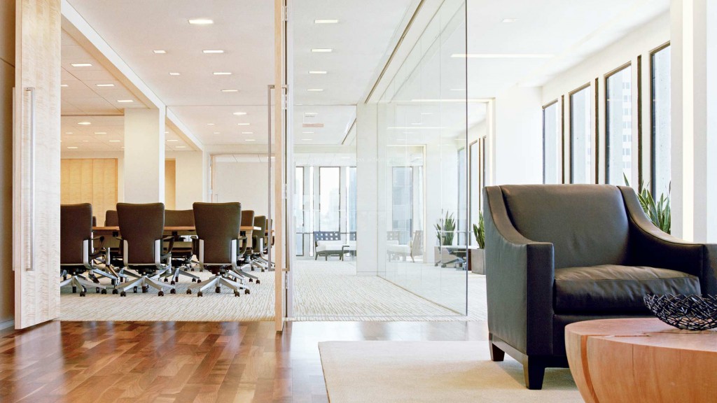 A living room with a wood floor.