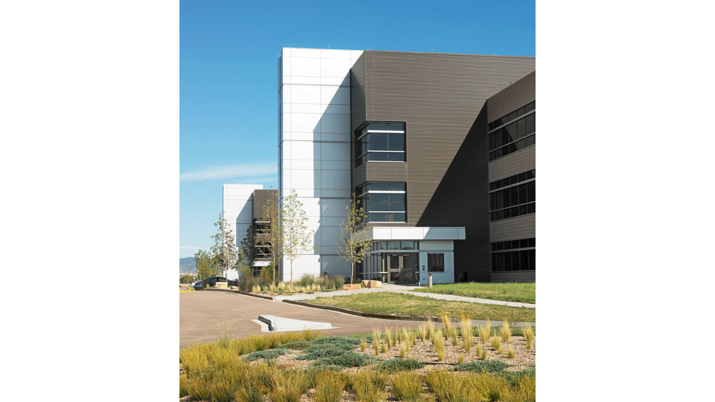 A building with a parking lot.