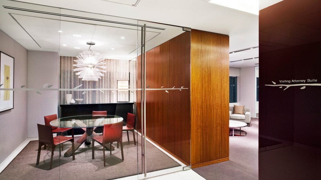 A room with a table and chairs.