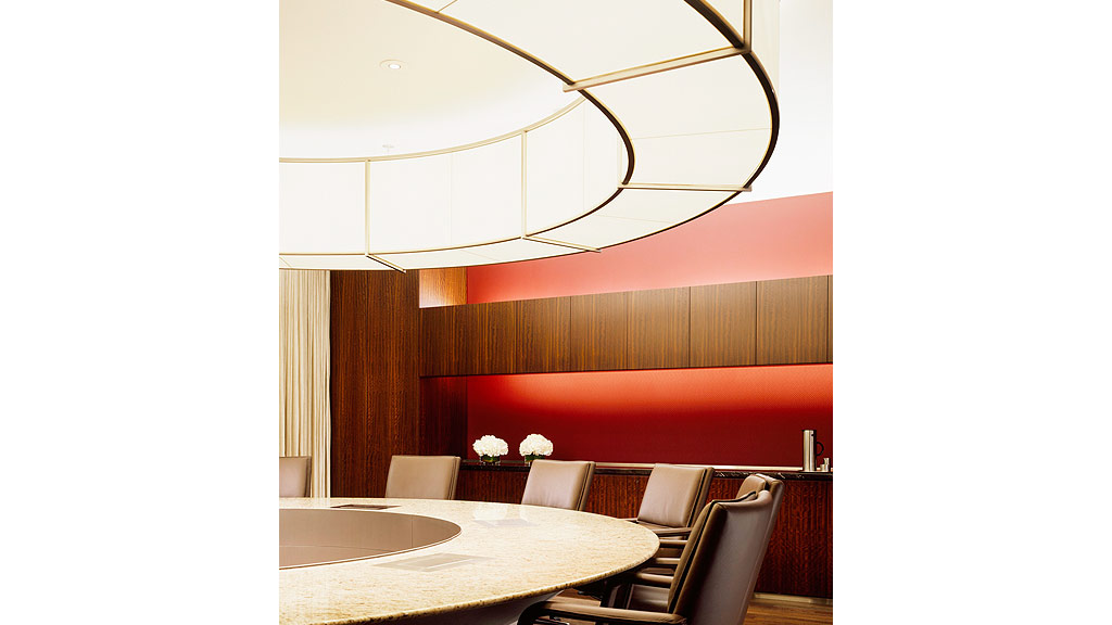 A room with a table and chairs.
