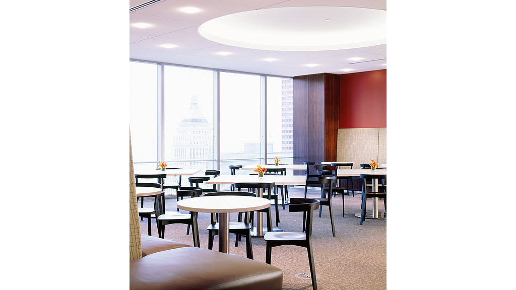 A room with tables and chairs.