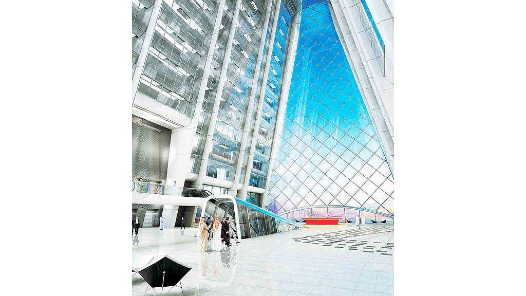 A group of people walking in a large building.