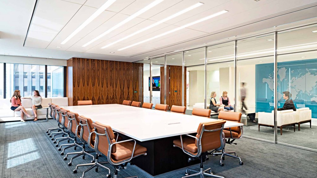 A group of people sitting around a table.