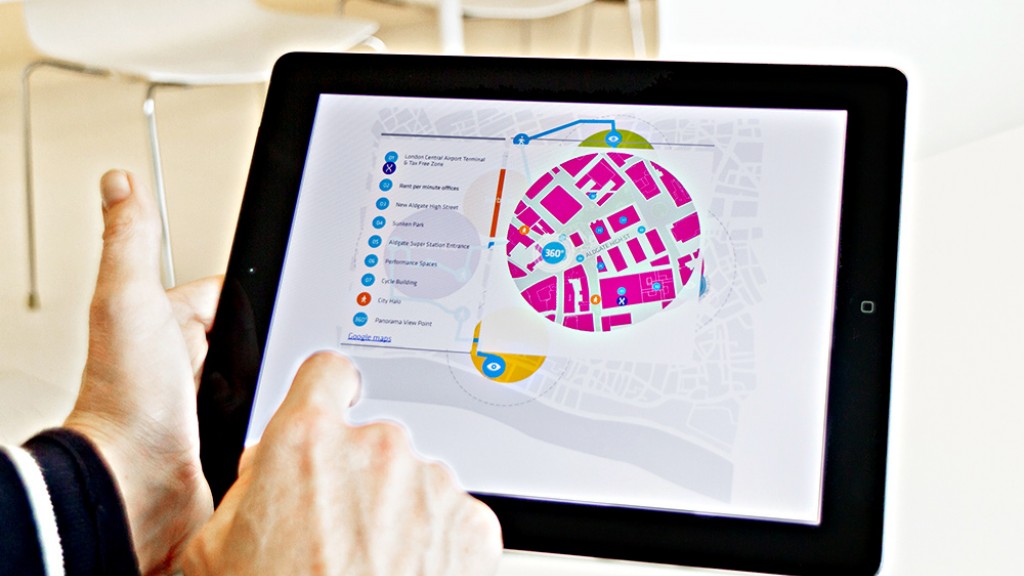 A person holding a tablet.