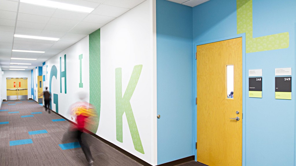 A person walking in a hallway.