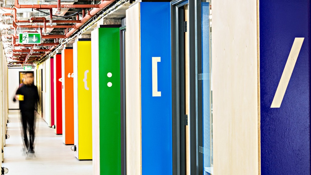 A person walking in a hallway.