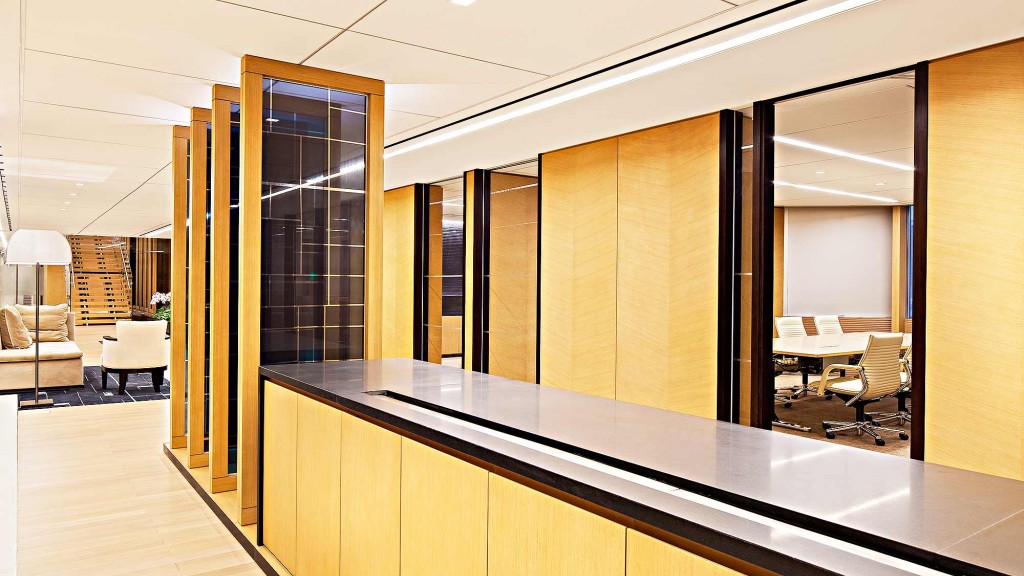 A modern kitchen with a large glass door.