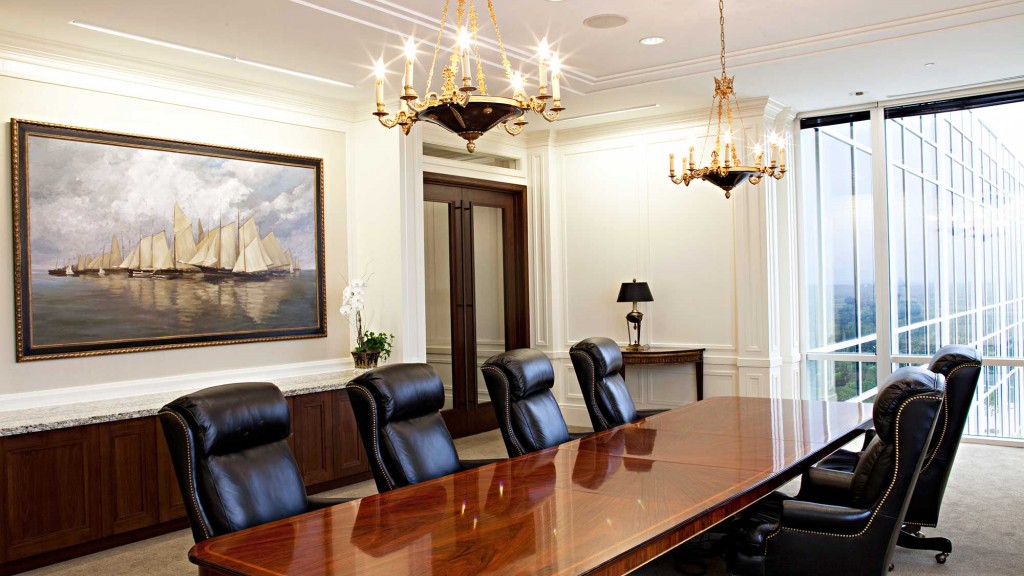 A room with a table and chairs.