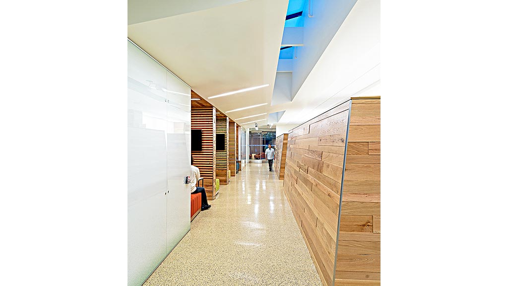 A person walking in a hallway.