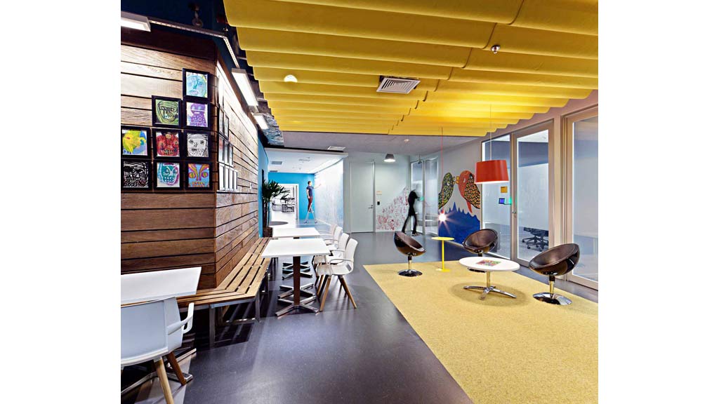 A room with tables and chairs.