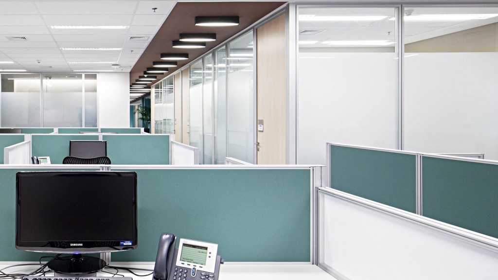 An office with a computer and a phone.