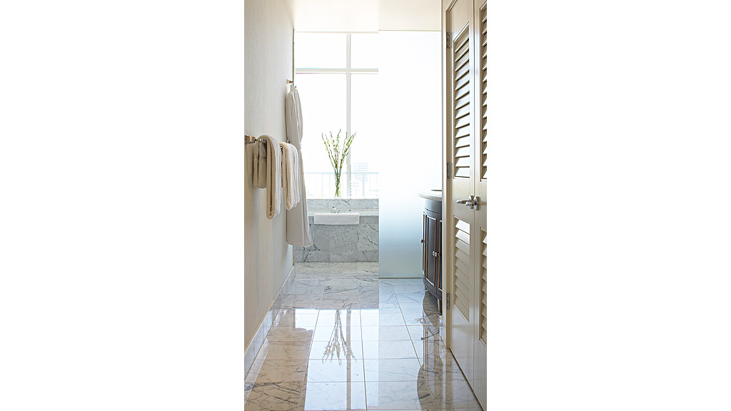 A bathroom with a tile floor.