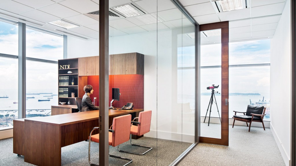 A person sitting at a desk.