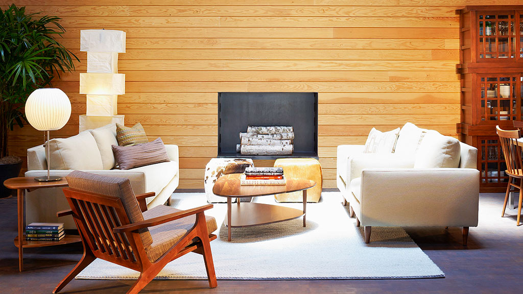 A living room with a fireplace.